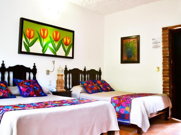Hotel Posada De Roger : photo 10 de la chambre chambre double avec 2 lits doubles