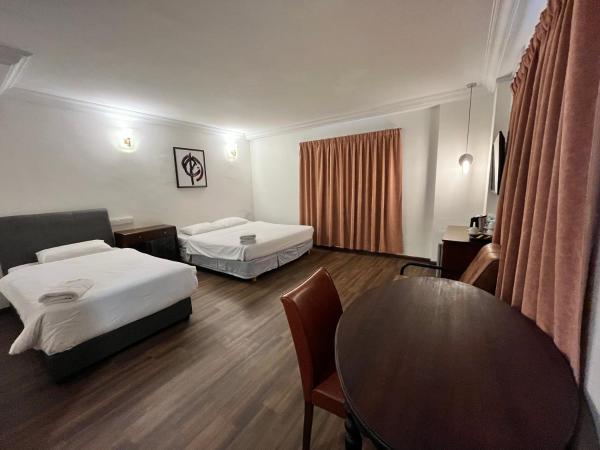 Fair Park Hotel : photo 1 de la chambre chambre triple supérieure