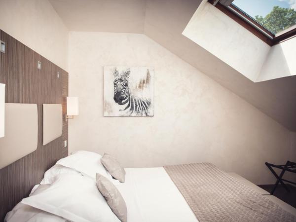 Les Olivades : photo 2 de la chambre chambre familiale supérieure