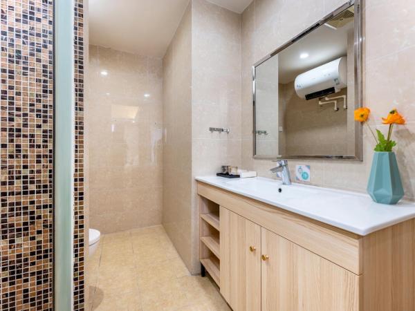 East Maple International Apartment - Guangzhou Luogang Wanda Plaza Suyuan Metro Station : photo 10 de la chambre chambre lit queen-size deluxe