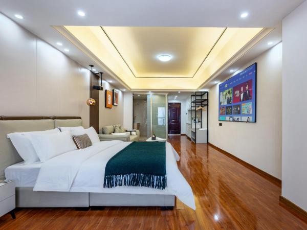 East Maple International Apartment - Guangzhou Luogang Wanda Plaza Suyuan Metro Station : photo 3 de la chambre chambre lit queen-size deluxe