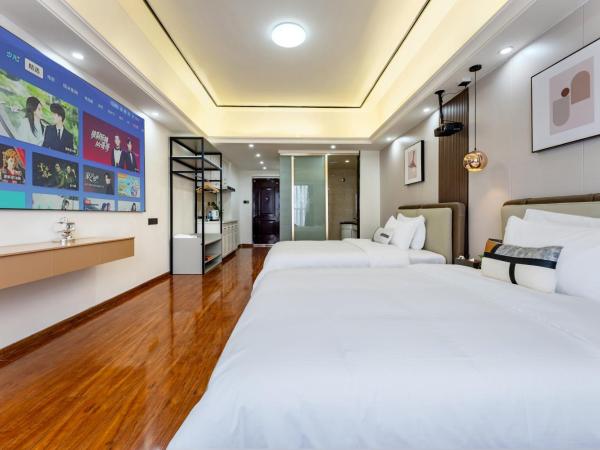 East Maple International Apartment - Guangzhou Luogang Wanda Plaza Suyuan Metro Station : photo 4 de la chambre chambre lits jumeaux deluxe