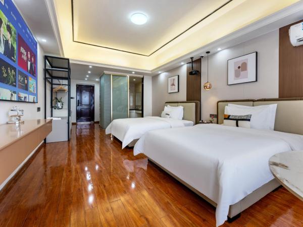 East Maple International Apartment - Guangzhou Luogang Wanda Plaza Suyuan Metro Station : photo 6 de la chambre chambre lits jumeaux deluxe