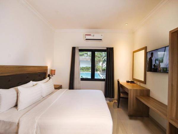 Grand Rohan Jogja : photo 1 de la chambre chambre familiale avec terrasse