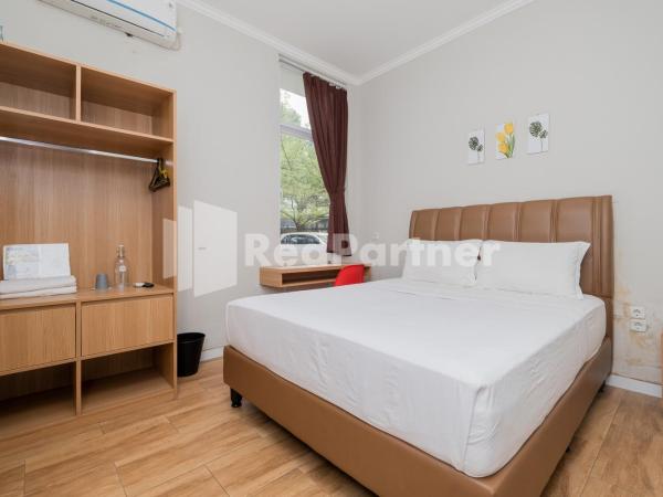 Palm Eight Mitra RedDoorz : photo 1 de la chambre chambre double deluxe