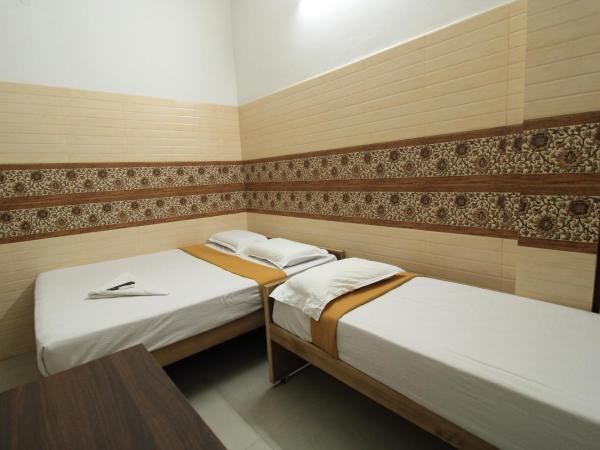 Just Guest House, Chennai Airport : photo 9 de la chambre chambre triple deluxe