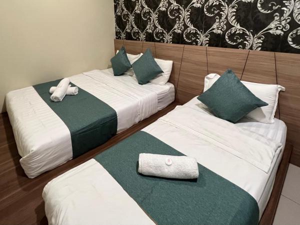 KUANTAN BESERAH BUDGET HOTEL : photo 1 de la chambre chambre triple