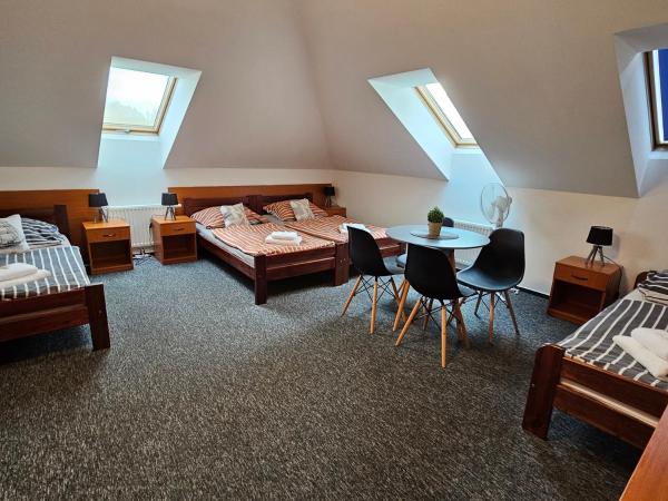 Penzion a Restaurace Simanda : photo 6 de la chambre chambre quadruple