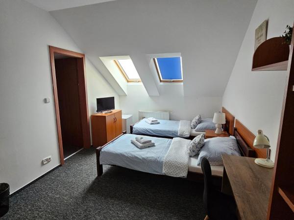 Penzion a Restaurace Simanda : photo 2 de la chambre petite chambre lits jumeaux