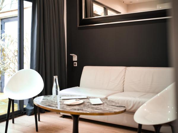 Le Palais Gallien Hôtel & Spa : photo 6 de la chambre suite avec terrasse et bain à remous
