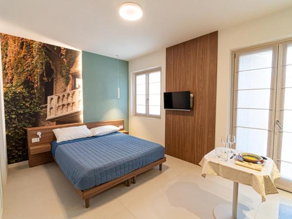 CASA LORENZO : photo 7 de la chambre chambre triple avec balcon