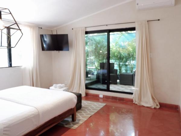 Hotel Boutique KAA : photo 4 de la chambre chambre lits jumeaux supérieure - vue sur jardin