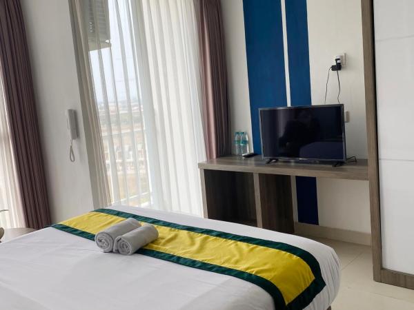 Hotel Dhika Serenity Surabaya : photo 1 de la chambre chambre deluxe