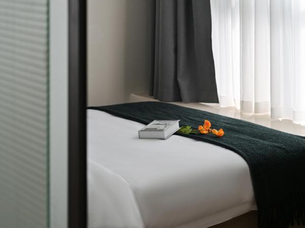 East Maple International Apartment - Guangzhou Luogang Wanda Plaza Suyuan Metro Station : photo 5 de la chambre appartement 2 chambres