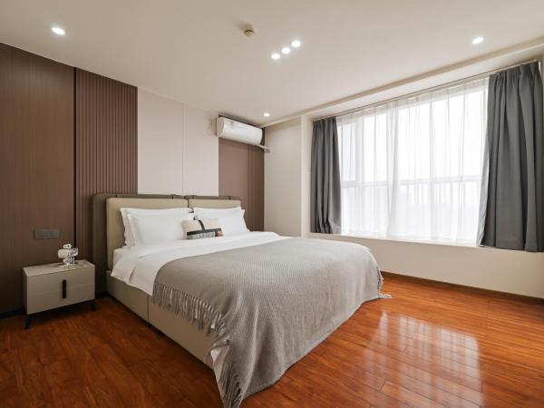 East Maple International Apartment - Guangzhou Luogang Wanda Plaza Suyuan Metro Station : photo 9 de la chambre appartement 2 chambres