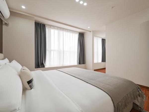 East Maple International Apartment - Guangzhou Luogang Wanda Plaza Suyuan Metro Station : photo 10 de la chambre appartement 2 chambres