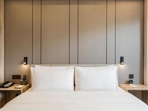 Atour Hotel Hangzhou Huanglong : photo 2 de la chambre suite supérieure - vue sur jardin