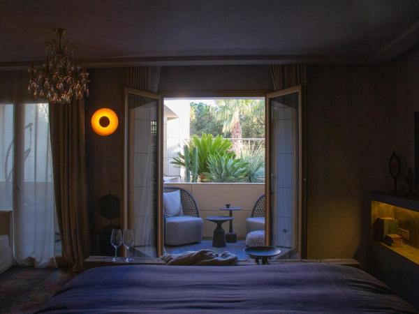 Hotel Unique : photo 10 de la chambre chambre double - vue sur jardin