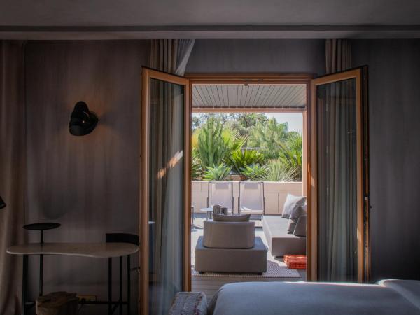 Unique Boutique Hotel Antibes Juan-les-Pins : photo 1 de la chambre chambre double ou lits jumeaux avec terrasse