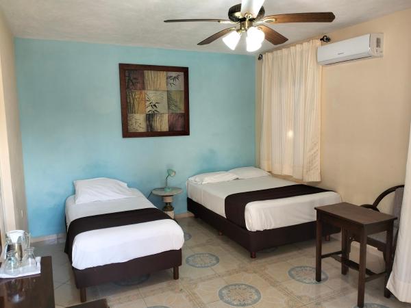 La Casa del Turix : photo 4 de la chambre chambre lits jumeaux avec salle de bains