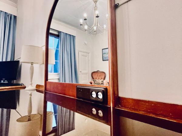 Senate Hotel : photo 4 de la chambre single room with city view - shared bathroom