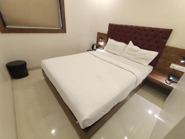 Hotel New Peninsula Suite - Near Masjid Bandar and CST Station - South Mumbai : photo 1 de la chambre chambre deluxe