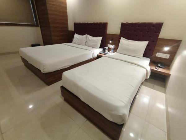 Hotel New Peninsula Suite - Near Masjid Bandar and CST Station - South Mumbai : photo 2 de la chambre chambre triple deluxe
