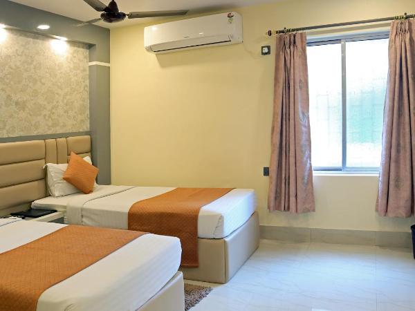 Hotel Executive Tower : photo 2 de la chambre chambre deluxe double ou lits jumeaux