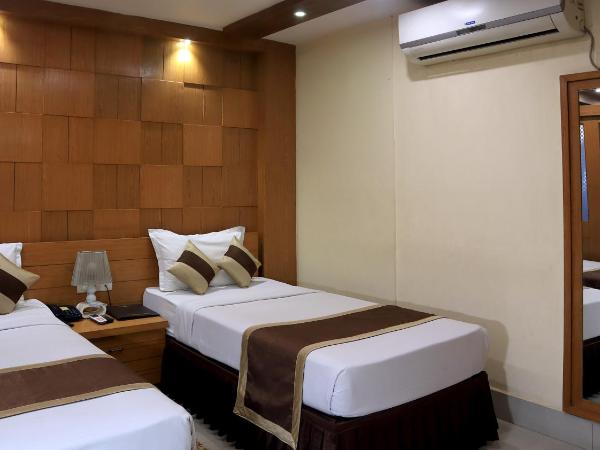 Hotel Executive Tower : photo 6 de la chambre chambre double ou lits jumeaux exécutive