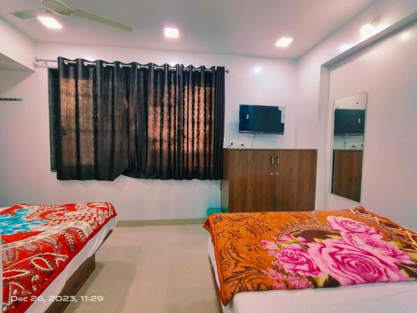 Amrit Guest House Pune : photo 9 de la chambre chambre triple Économique