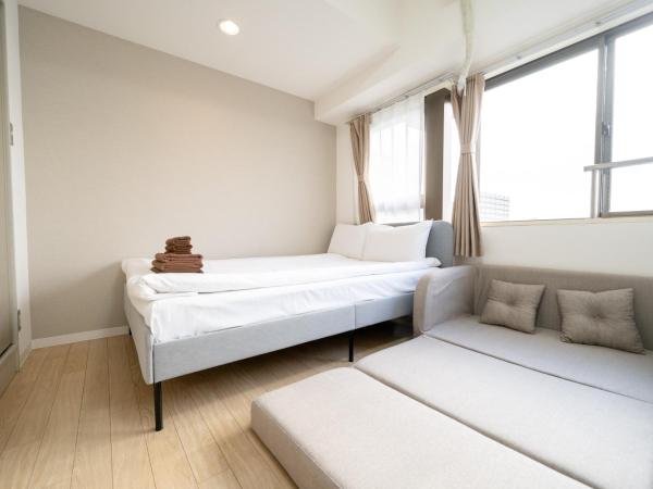 Nishinippori Guest House : photo 5 de la chambre chambre double ou lits jumeaux avec salle de bains privative