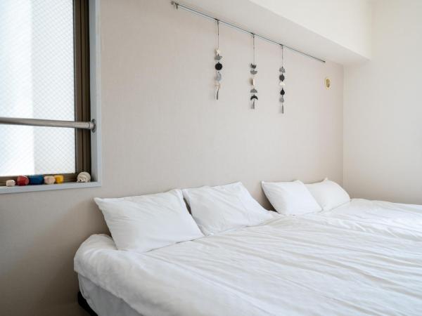 Nishinippori Guest House : photo 8 de la chambre chambre quadruple avec salle de bains privative