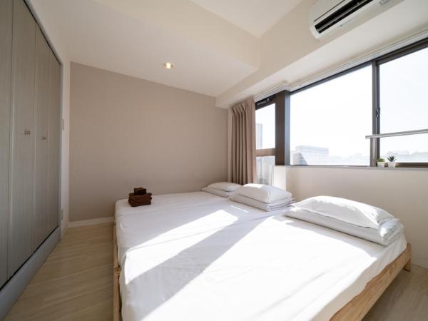 Sendagi Guest House : photo 4 de la chambre chambre triple avec baignoire