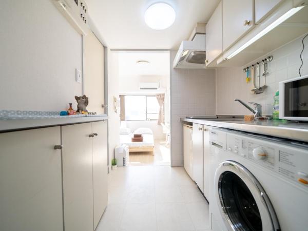 Sendagi Guest House : photo 7 de la chambre chambre triple avec baignoire