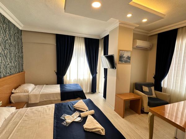 Serenity suites Hotel : photo 2 de la chambre chambre triple supérieure