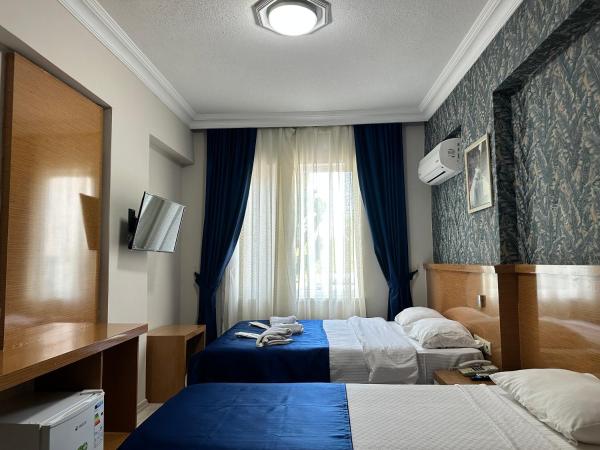 Serenity suites Hotel : photo 4 de la chambre chambre quadruple