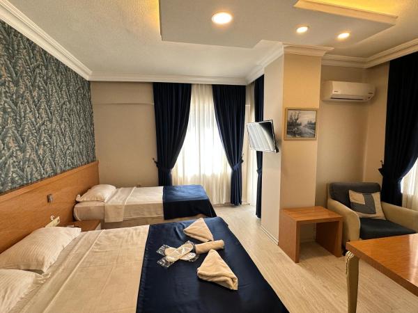 Serenity suites Hotel : photo 3 de la chambre chambre triple supérieure