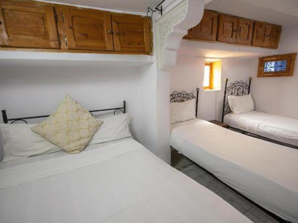 Riad Fez Hostel : photo 1 de la chambre chambre quadruple supérieure