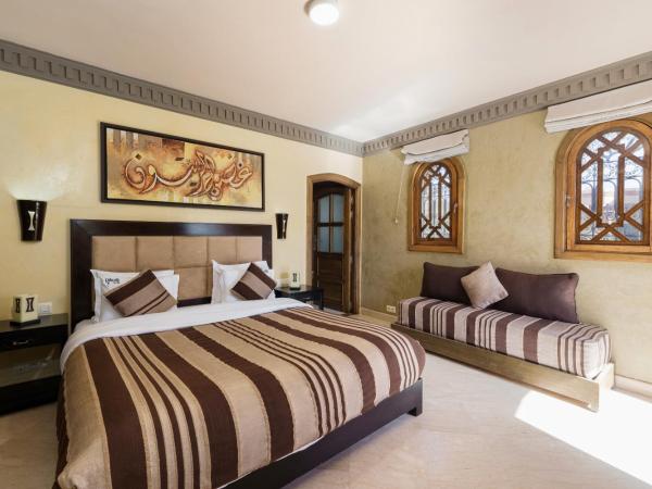 Riad Ushuaia La Villa - Centre Marrakech : photo 1 de la chambre chambre double deluxe avec balcon