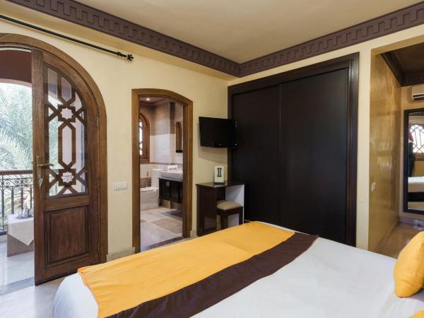Riad Ushuaia La Villa - Centre Marrakech : photo 10 de la chambre chambre deluxe double ou lits jumeaux