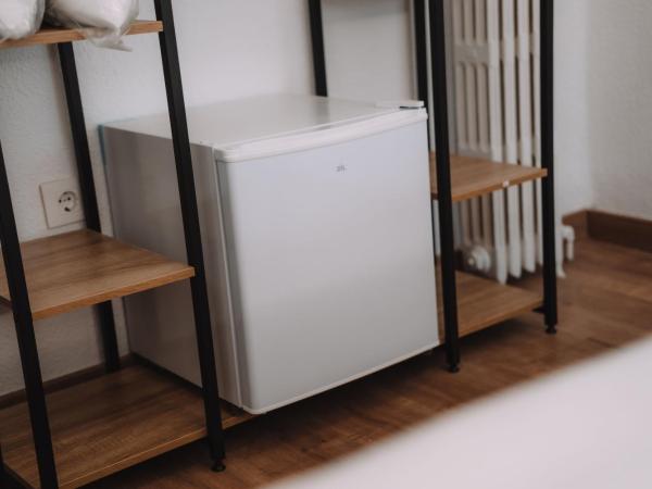 Concept Rooms : photo 8 de la chambre chambre triple avec salle de bains privative séparée