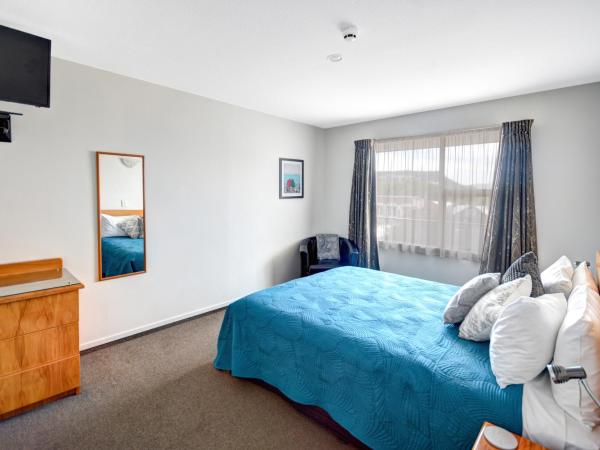 Alexis Motor Lodge : photo 1 de la chambre appartement 1 chambre avec baignoire spa