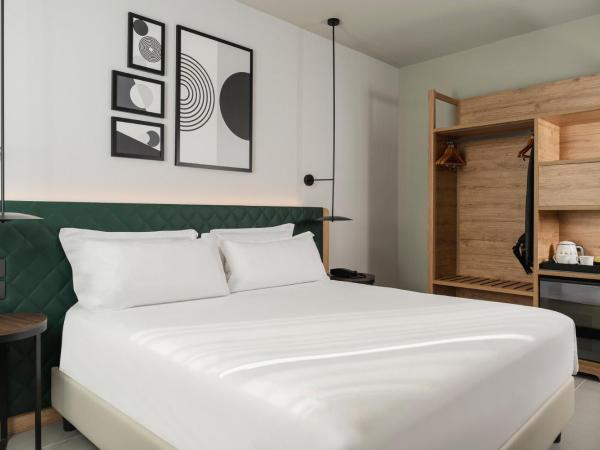 Hilton Garden Inn Bologna North : photo 8 de la chambre suite 2 chambres avec lit king-size