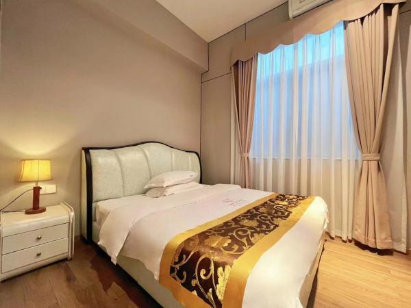 广州沃家国际公寓 : photo 9 de la chambre suite avec balcon