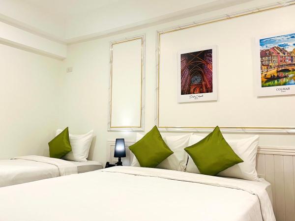 Travelier Hostel : photo 3 de la chambre chambre triple deluxe