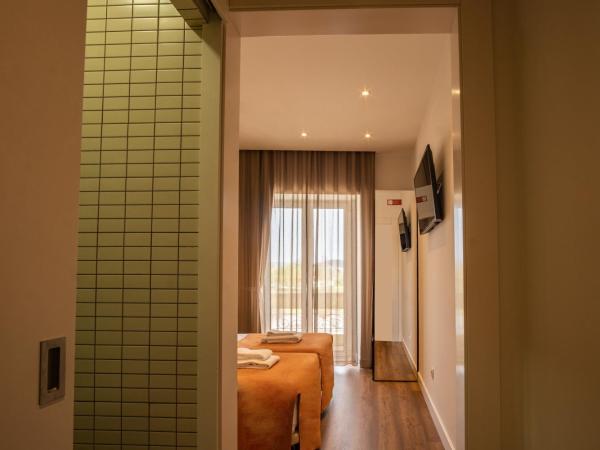 Riversuites : photo 7 de la chambre chambre lits jumeaux basique