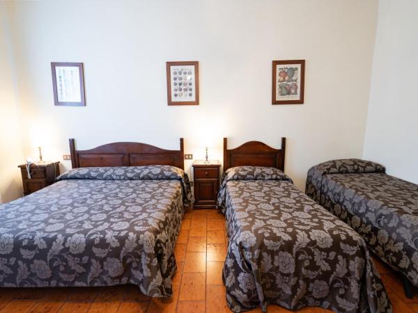 Hotel Tivoli : photo 7 de la chambre chambre quadruple