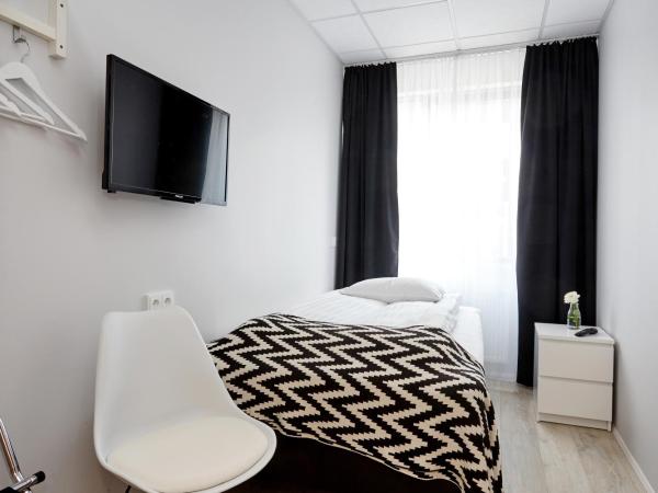 Hótel Heiðmörk : photo 1 de la chambre chambre simple avec baignoire