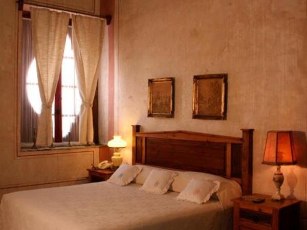 Hotel Boutique Casa de la Palma : photo 1 de la chambre suite lit king-size avec balcon