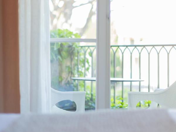 Hotel des Lices : photo 5 de la chambre chambre double ou lits jumeaux